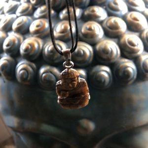 Sterling silver tigers eye carved Buddha pendant